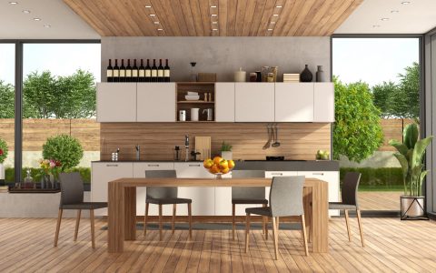 White and wooden modern kitchen with dining table and garden on background - 3d rendering